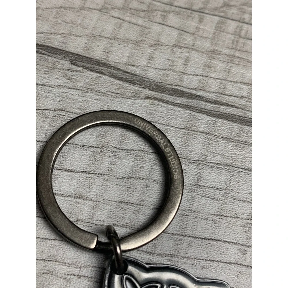 Universal Studios Harry Potter Spinning Hogwarts Keychain Zoe Nameplate Pewter